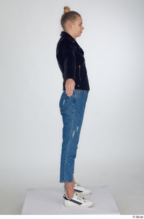 Kate Jones black leather jacket blue jeans casual dressed standing…